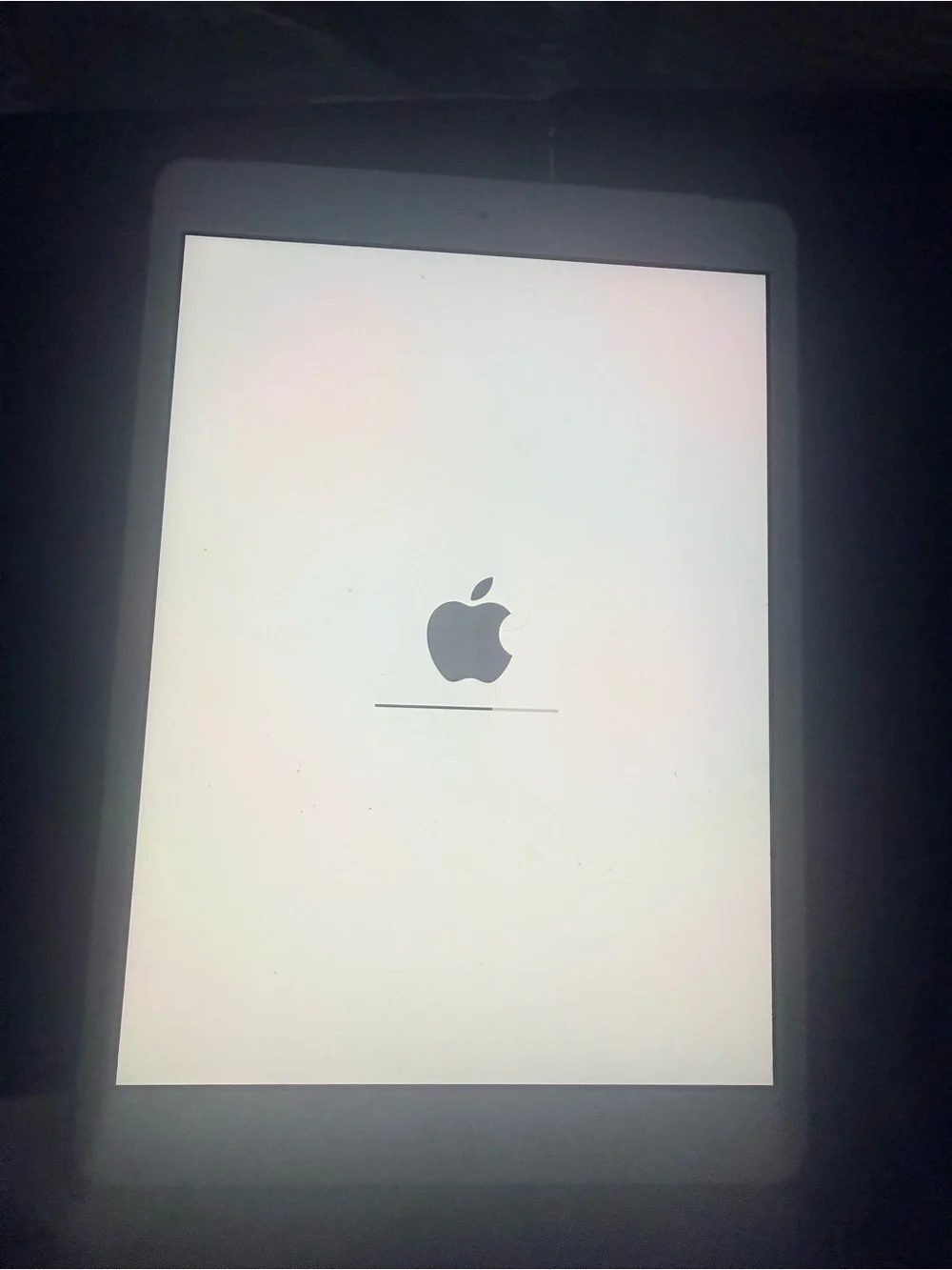 Apple White Tablet with Rainbow Hello Display